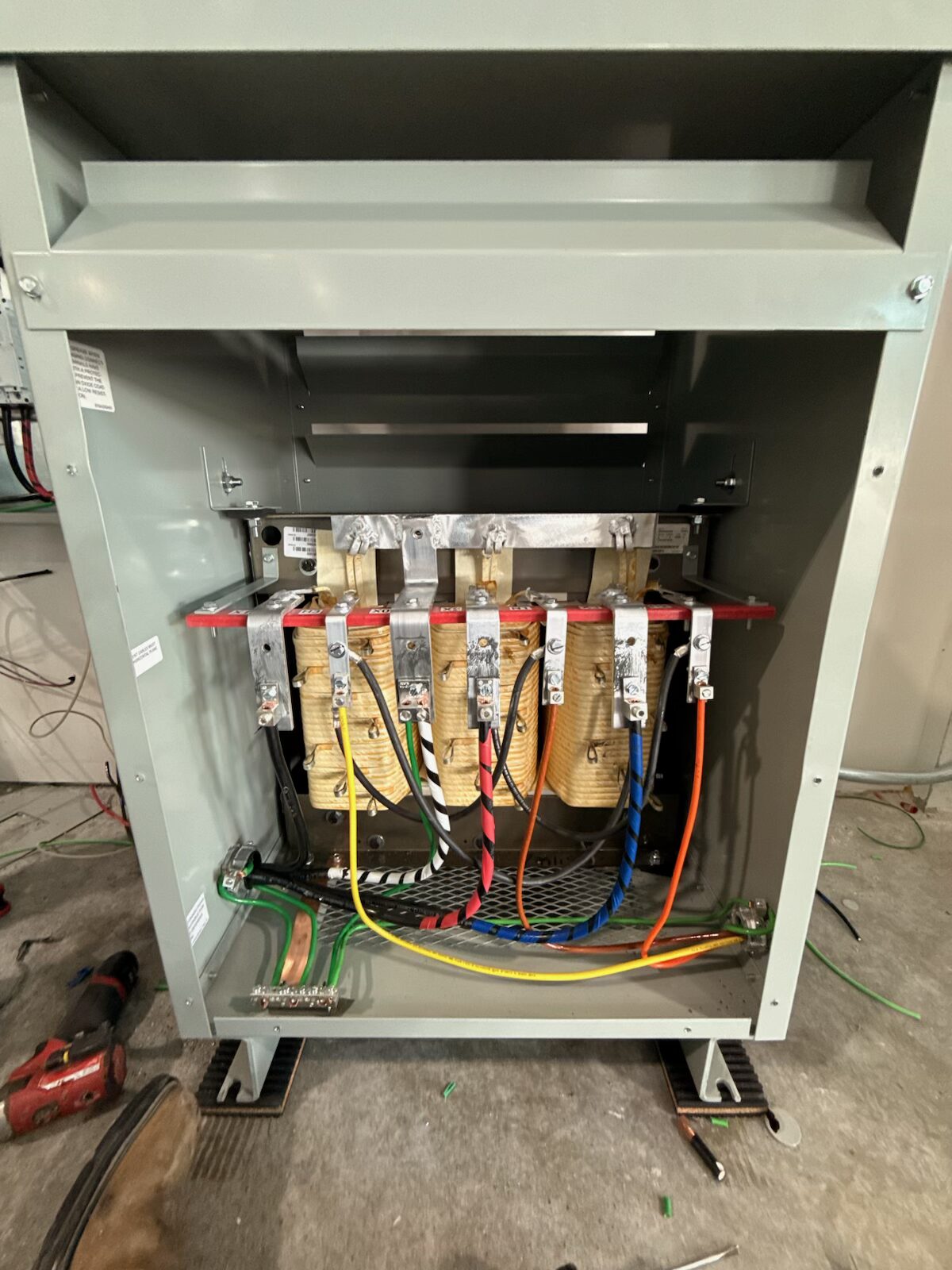 45kVA Eaton transformer interior showing three-phase windings and conductor terminations — Cyber Electric LLC