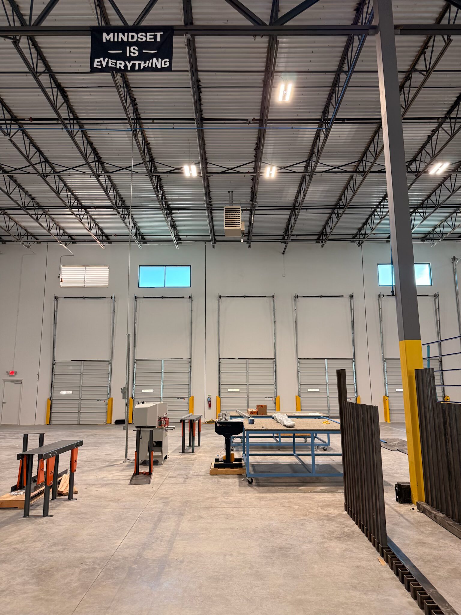 Commercial warehouse interior with new LED high-bay lighting fully operational — Cyber Electric LLC