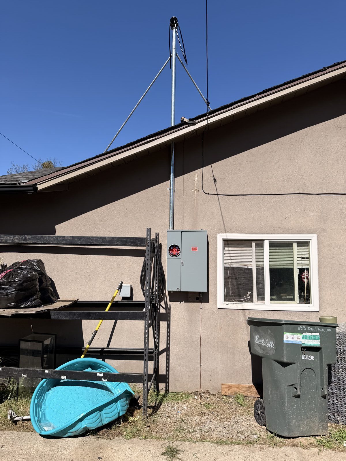 New service entrance mast and meter socket installed on exterior wall — Cyber Electric LLC, Modesto CA